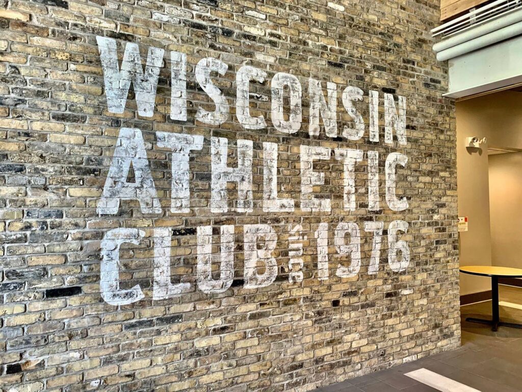 Wisconsin Athletic Club sign on brick wall