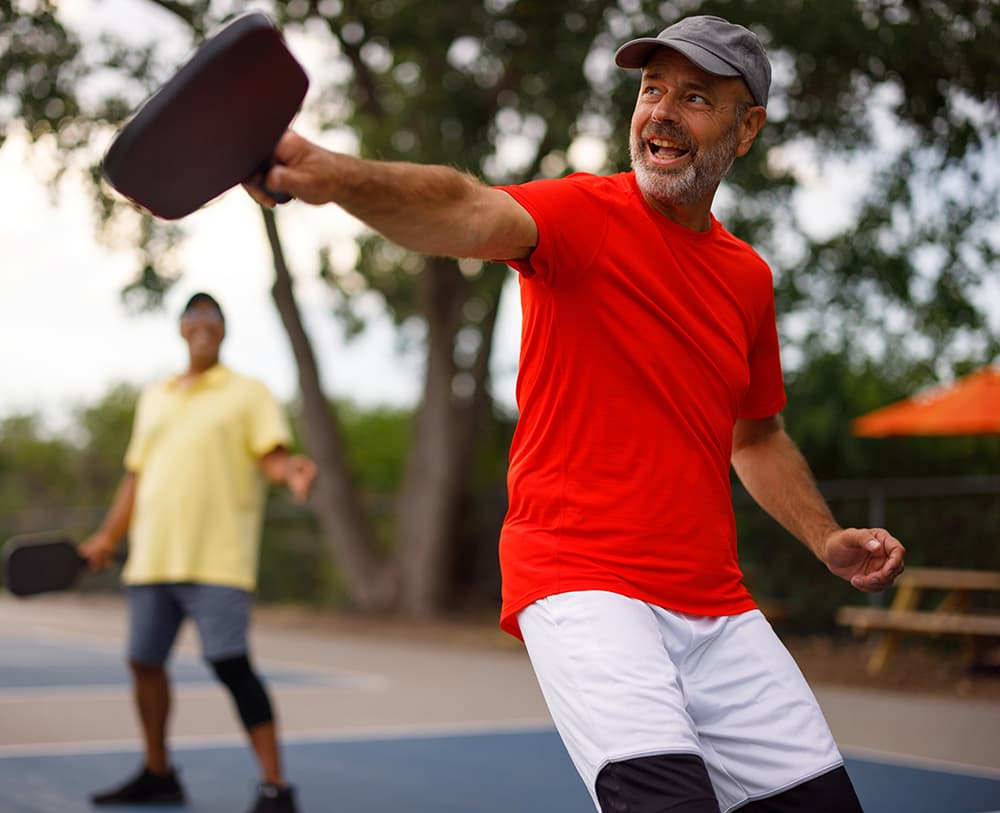 Man plays pickleball