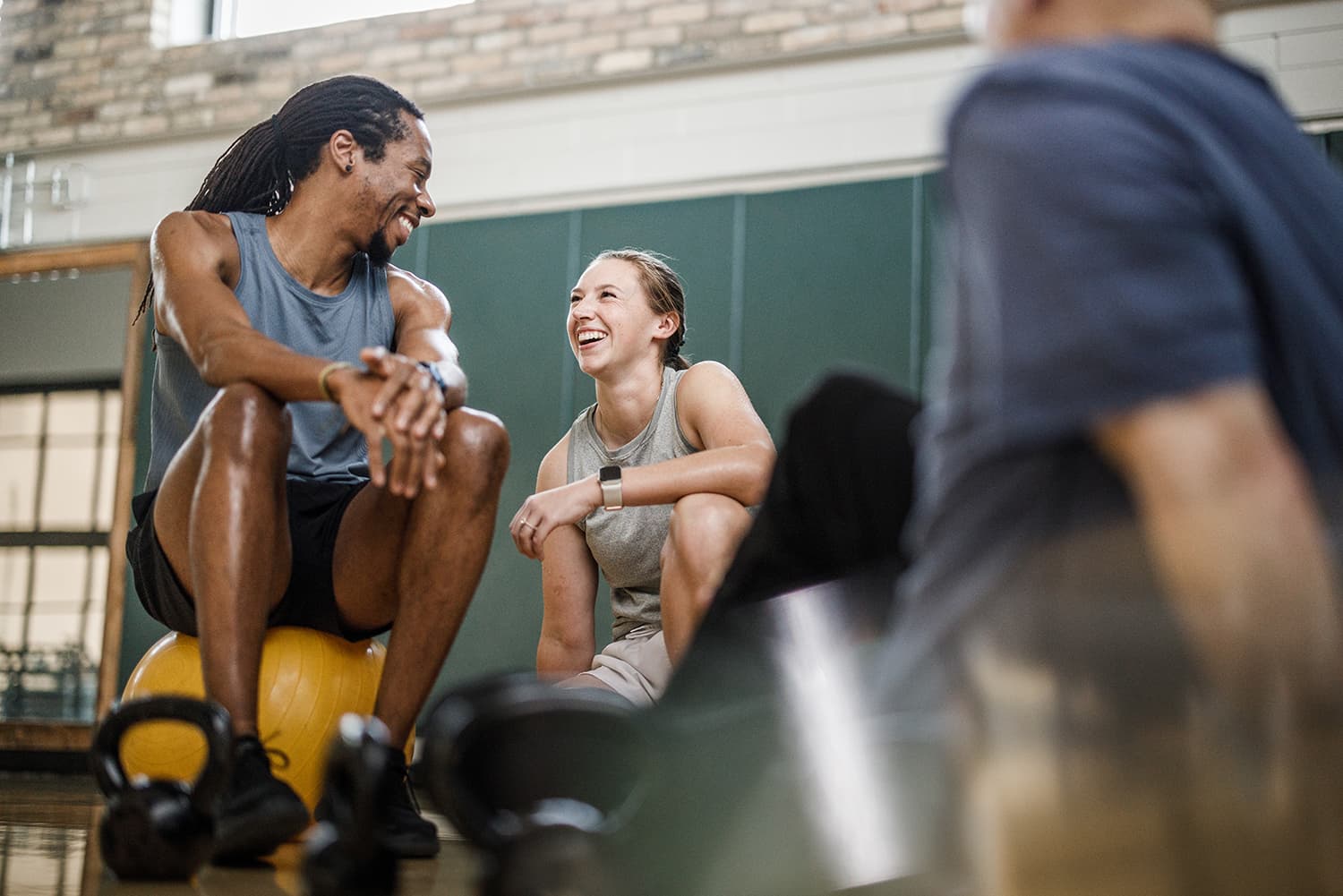 WAC Members socialize after a kettlebell workout