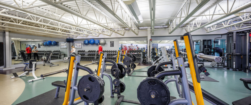 Lower Weight Room at WAC Lake Country free weights benches cables weight machines lifting