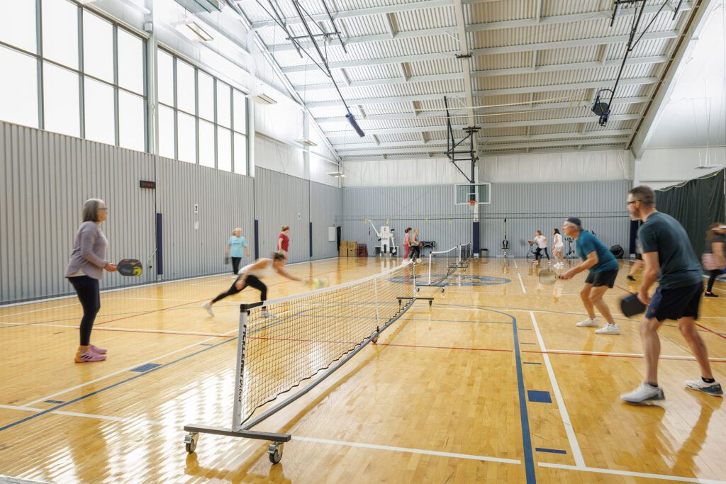 Indoor pickleball on the basketball court gym at WAC Lake Country