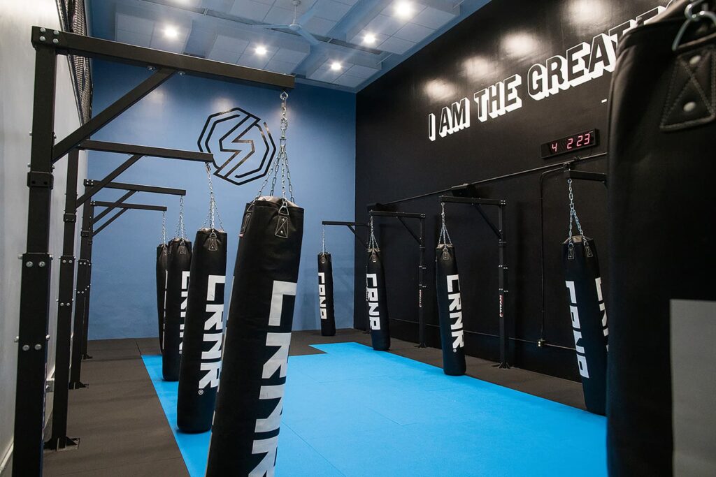 strike studio boxing gym with large bags